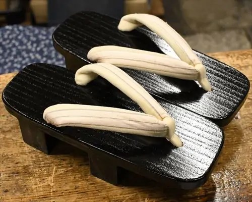 黒捌き芳町に結城紬福林花緒