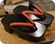 黒捌き大千両に木綿内玉花緒