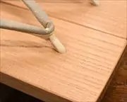 ツボ下がり真角に爪唐草柄印伝花緒　前壷