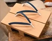 ツボ下がり真角にタピール二石花緒